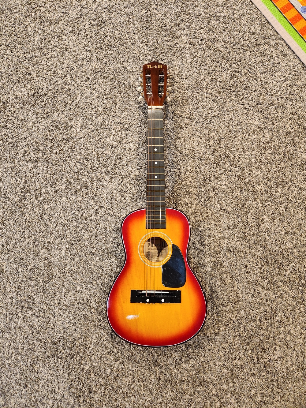 mark. Sunburst Mini Acoustic Guitar – Red/Orange Finish